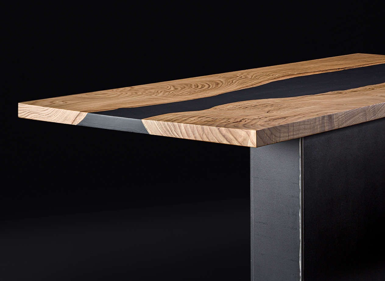 The merits of resin and solid wood tables